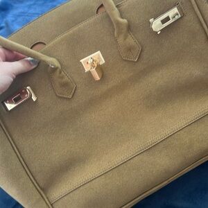 Light brown color bag.